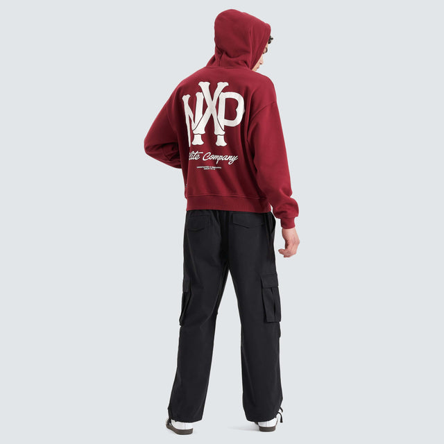 Model Wears Pursuits Heavy Box Fit Hooded Sweater Cabernet Hoodies in Red - Image 2