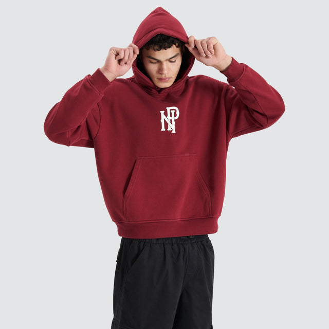 Model Wears Pursuits Heavy Box Fit Hooded Sweater Cabernet Hoodies in Red - Image 3