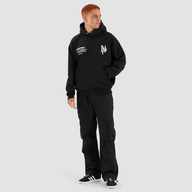 Model Wears Radian Box Fit Hoodie Jet Black Hoodies in Black - Image 5