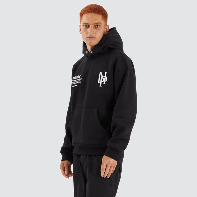 Model Wears Radian Box Fit Hoodie Jet Black Hoodies in Black - Image 4
