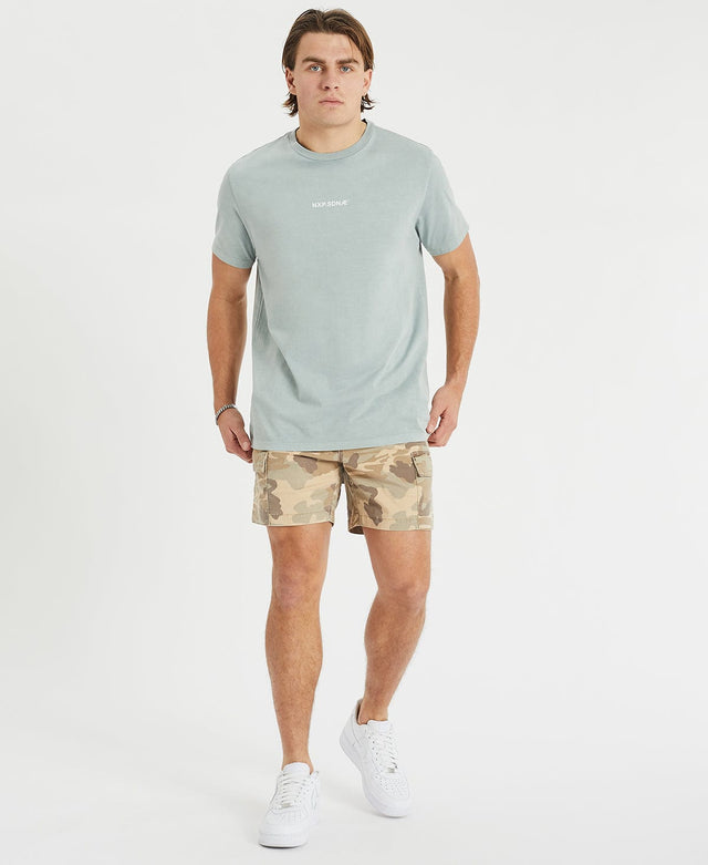 Model Wears Rampage Cargo Short Camo Shorts in Camo - Image 3