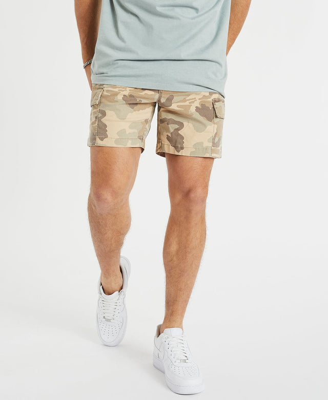 Model Wears Rampage Cargo Short Camo Shorts in Camo - Image 1