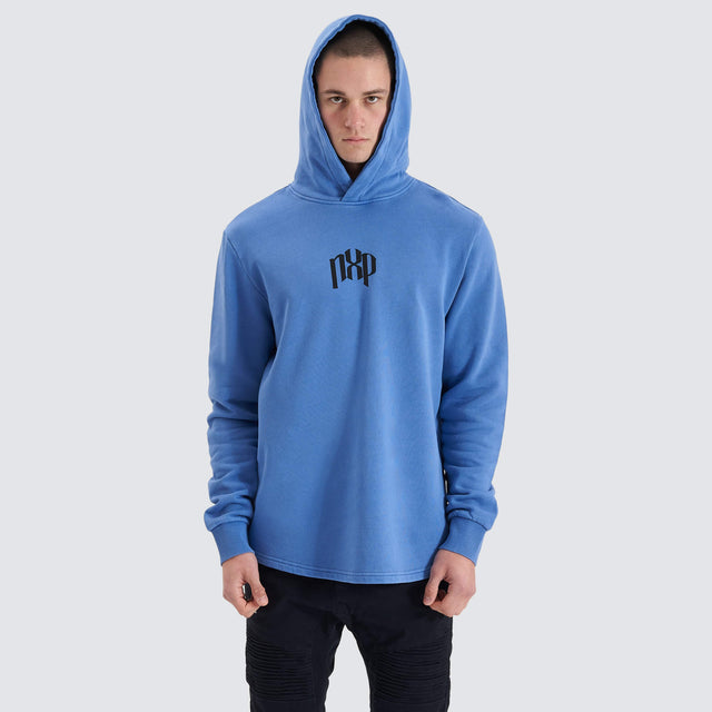 Model Wears Rubble Dual Curved Hoodie Pigment Dutch Blue Hoodies in Blue - Image 2