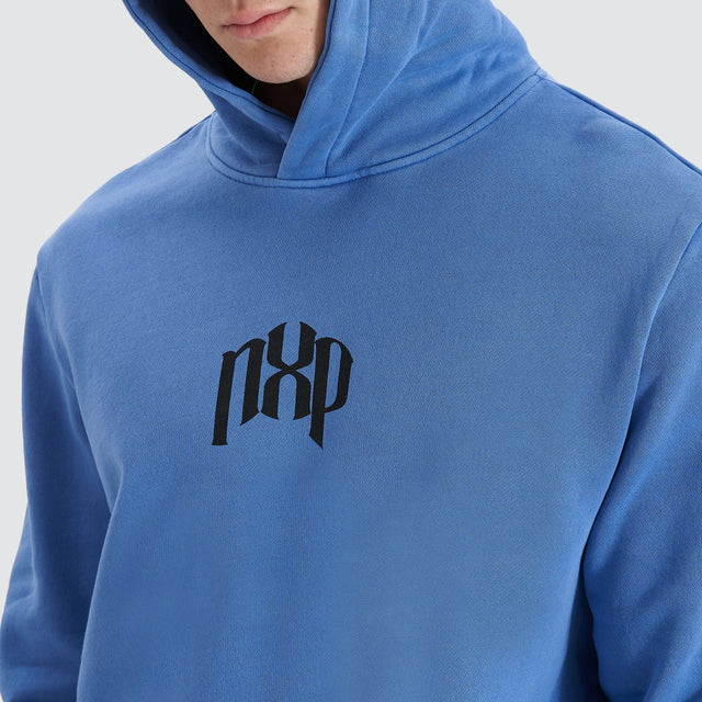 Model Wears Rubble Dual Curved Hoodie Pigment Dutch Blue Hoodies in Blue - Image 5