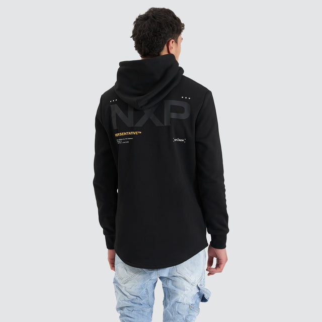 Model Wears Spire Dual Curved Hoodie Jet Black Hoodies in Black - Image 2