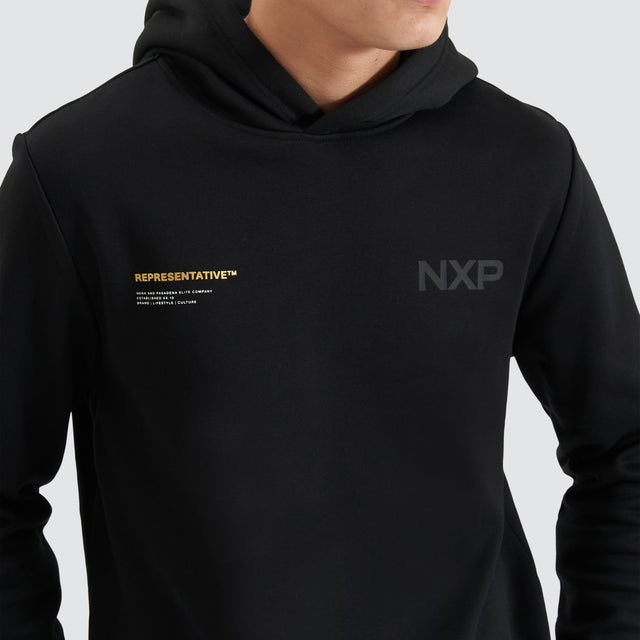 Model Wears Spire Dual Curved Hoodie Jet Black Hoodies in Black - Image 5