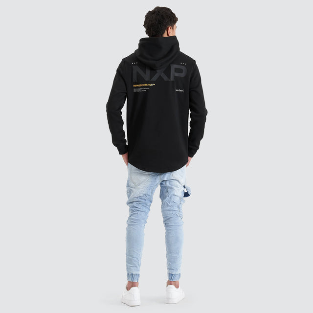 Model Wears Spire Dual Curved Hoodie Jet Black Hoodies in Black - Image 4