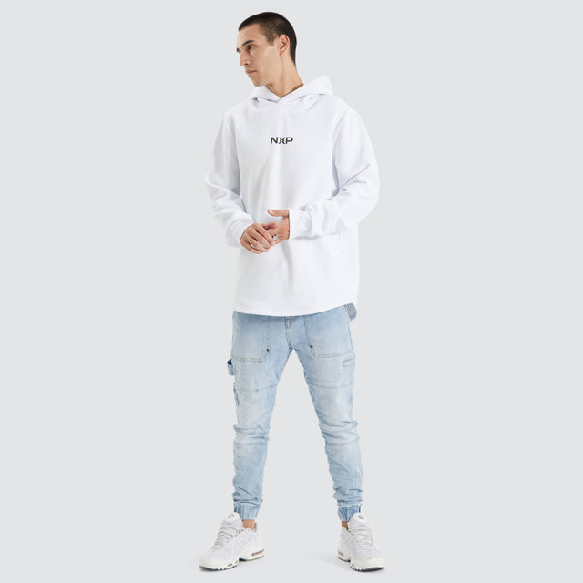Model Wears Styche Dual Curved Hoodie Optical White Hoodies in White - Image 4