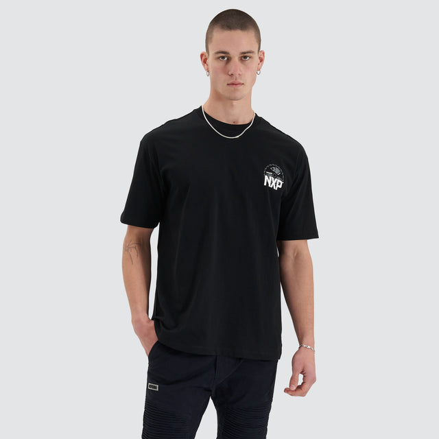 Model Wears Superstructure Heavy Box Fit Tee Jet Black T-Shirts in Black - Image 5