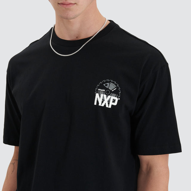 Model Wears Superstructure Heavy Box Fit Tee Jet Black T-Shirts in Black - Image 3