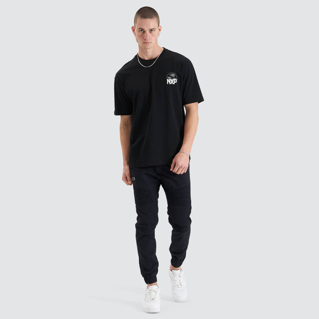Model Wears Superstructure Heavy Box Fit Tee Jet Black T-Shirts in Black - Image 2