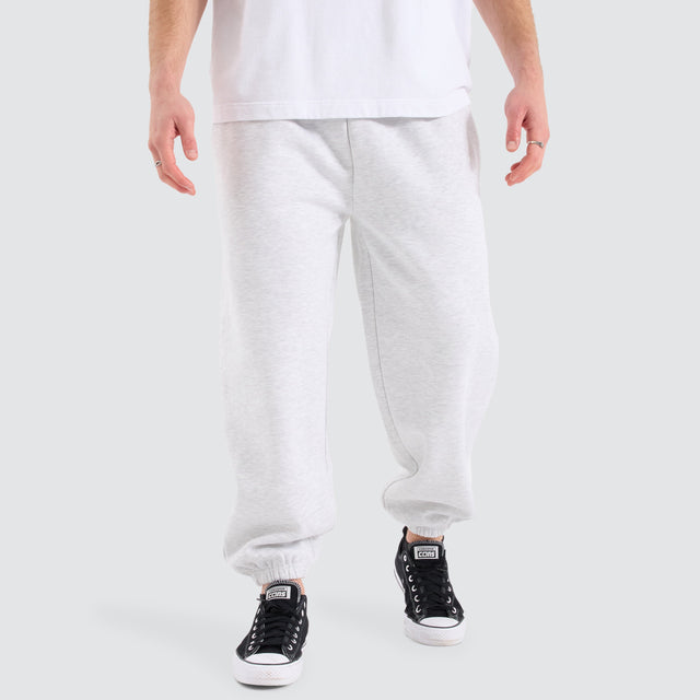 Model Wears Supply Baggy Sweat Pant Snow Marle Trackpants in White - Image 1