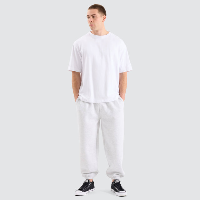 Model Wears Supply Baggy Sweat Pant Snow Marle Trackpants in White - Image 2