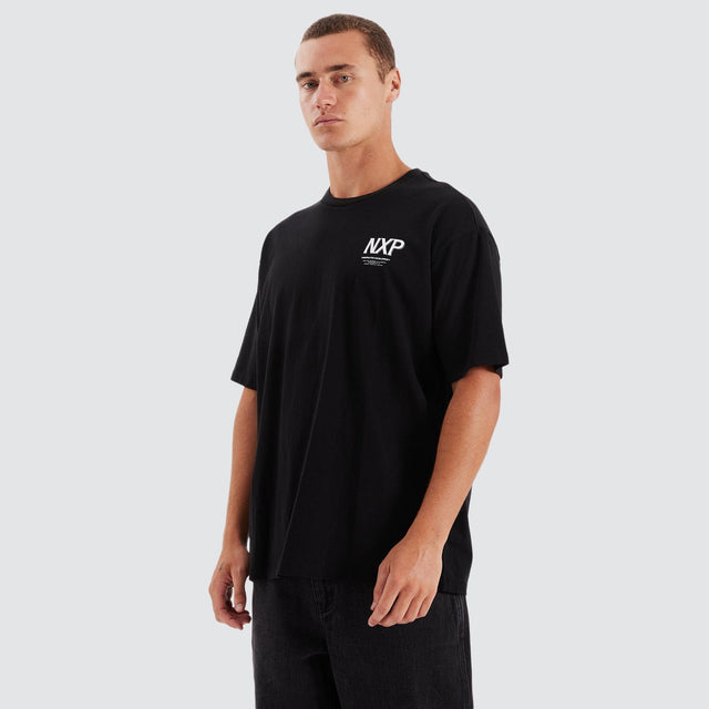 Model Wears Suspension Heavy Box Fit Tee Jet Black T-Shirts in Black - Image 5