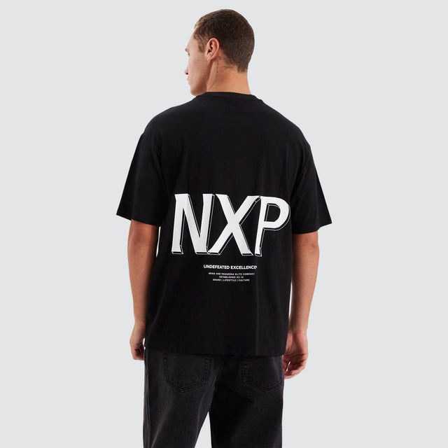 Model Wears Suspension Heavy Box Fit Tee Jet Black T-Shirts in Black - Image 1