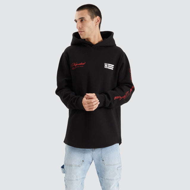 Model Wears Sutton Hooded Dual Curved Sweater Jet Black Hoodies in Black - Image 3