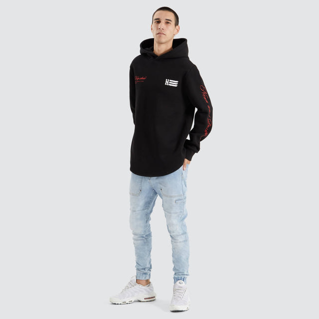 Model Wears Sutton Hooded Dual Curved Sweater Jet Black Hoodies in Black - Image 4
