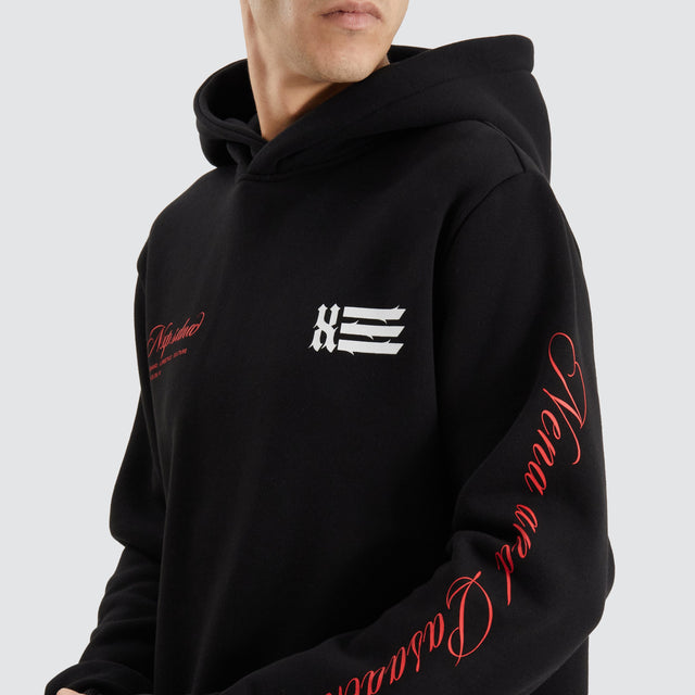 Model Wears Sutton Hooded Dual Curved Sweater Jet Black Hoodies in Black - Image 5