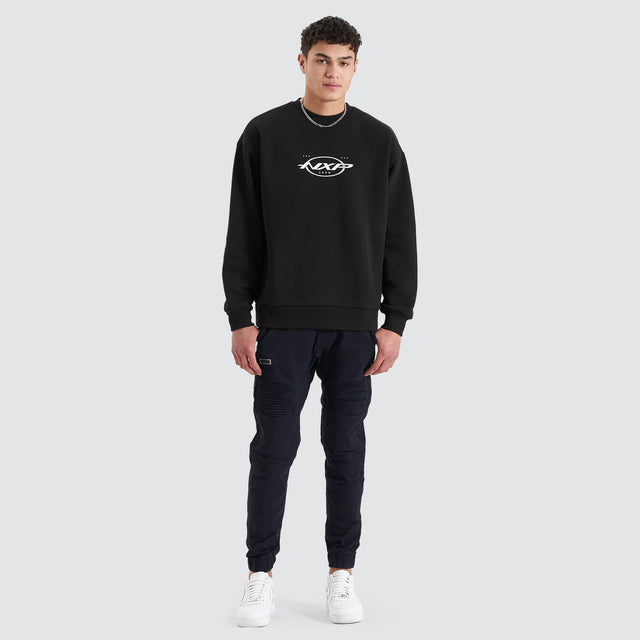 Model Wears Tracery Heavy Relaxed Jumper Jet Black Jumpers in Black - Image 4
