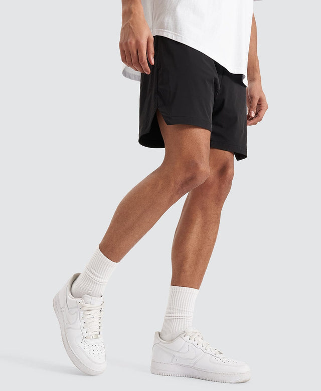 Model Wears Trigger Elastic Waist Shorts Jet Black Shorts in Black - Image 6