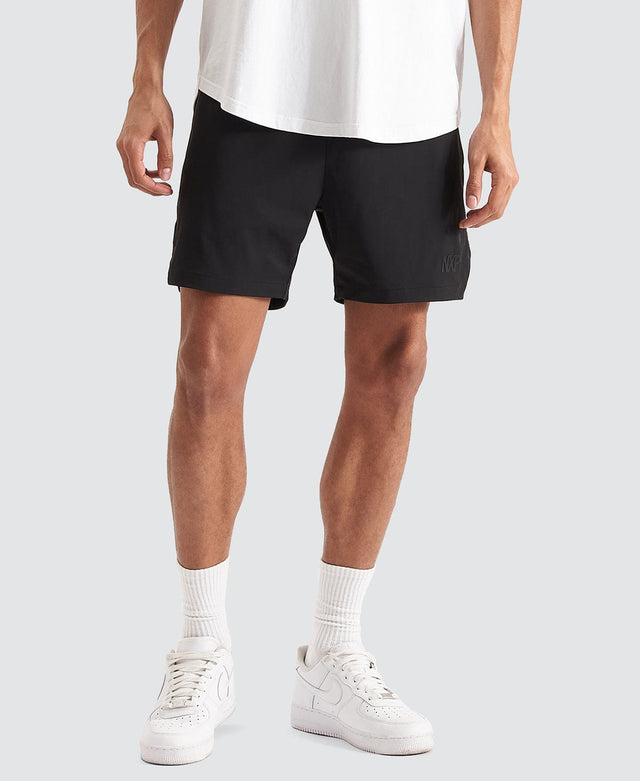 Model Wears Trigger Elastic Waist Shorts Jet Black Shorts in Black - Image 1