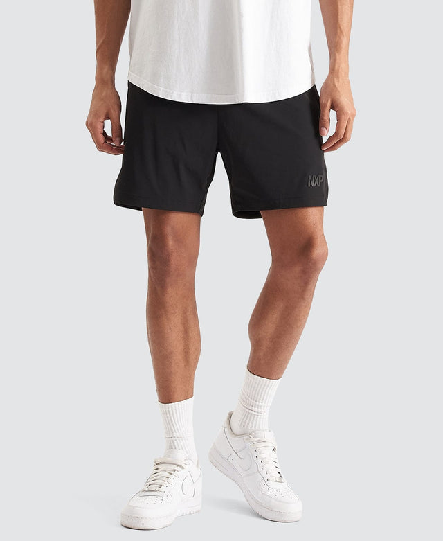Model Wears Trigger Elastic Waist Shorts Jet Black Shorts in Black - Image 3