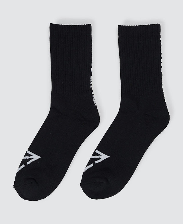 Model Wears Triple 2PK Mid Socks Black Socks in Black - Image 4