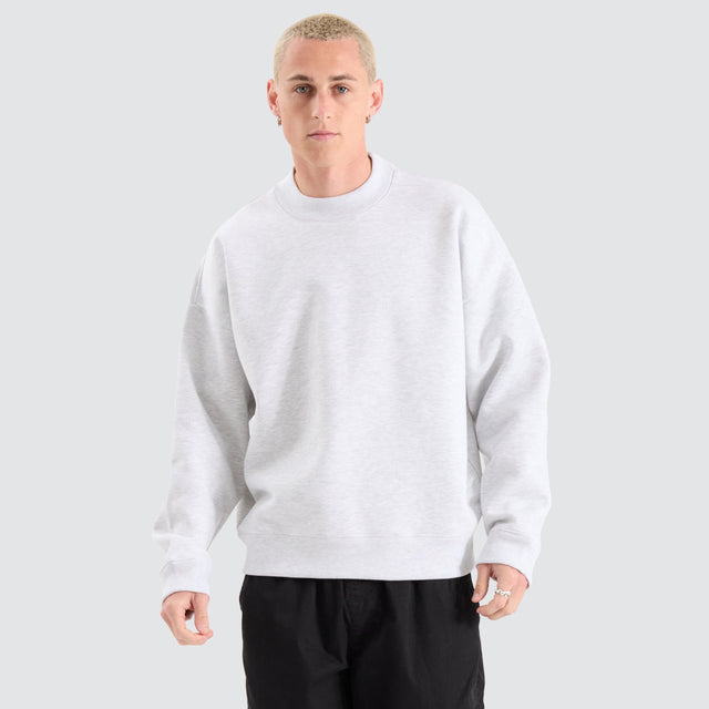 Model Wears Tulsa Box Fit Sweater Snow Marle Jumpers in White - Image 1