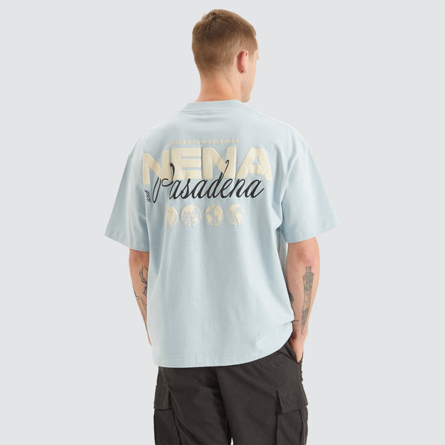 Model Wears Worldwide Heavy Street Tee Baby Blue T-Shirts in Blue - Image 1