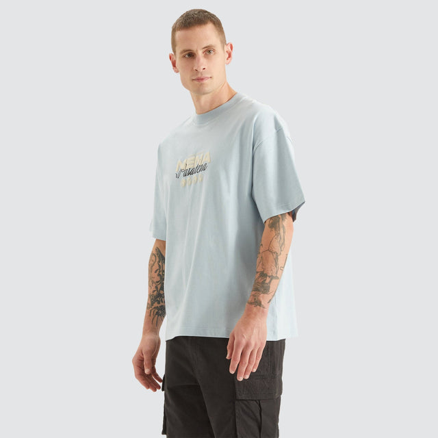Model Wears Worldwide Heavy Street Tee Baby Blue T-Shirts in Blue - Image 2