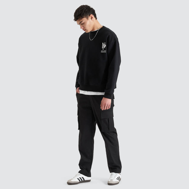 Model Wears Wright Heavy Box Fit Sweater Jet Black Jumpers in Black - Image 3