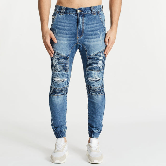 Model Wears Hellcat Pant Detroit Blue Pants in Blue - Image 5