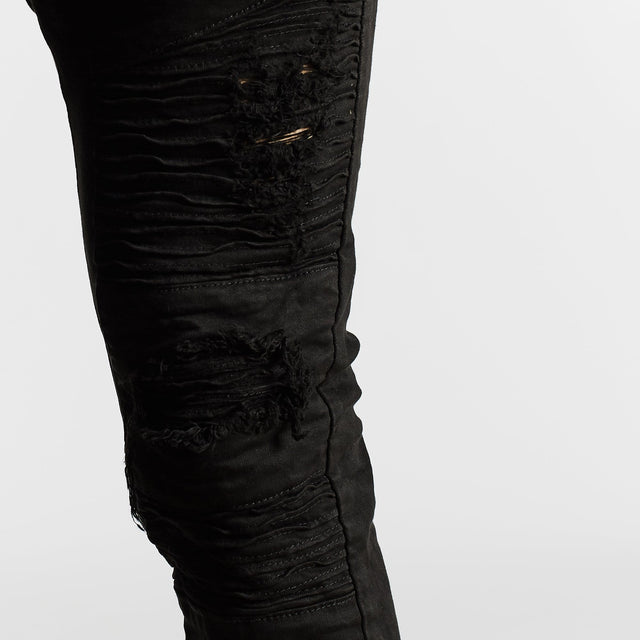 Model Wears Hellcat Pants Black Pants in Black - Image 7