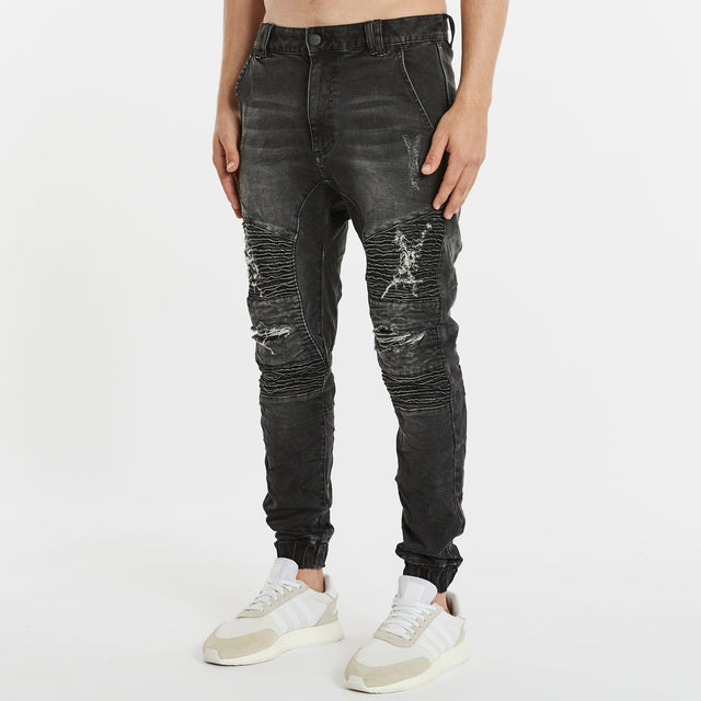 Model Wears Hellcat Pants Heavy Metal Black Pants in Black - Image 5