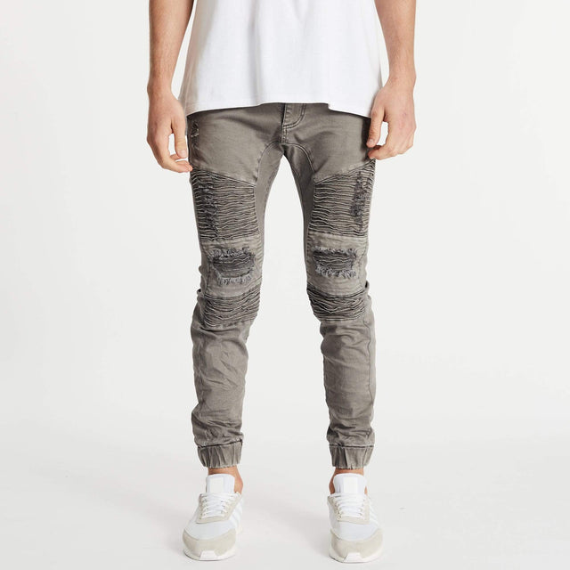 Model Wears Hellcat Pants Volcano Pants in Grey - Image 1