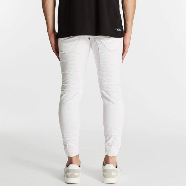 Model Wears Hellcat Pants White Pants in White - Image 2