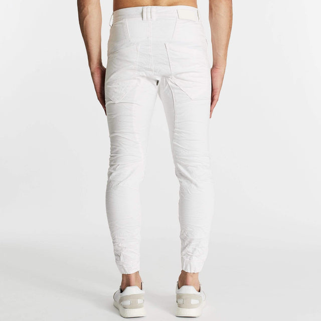Model Wears Hellcat Pants White Pants in White - Image 5