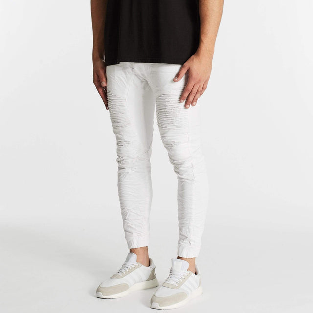 Model Wears Hellcat Pants White Pants in White - Image 3