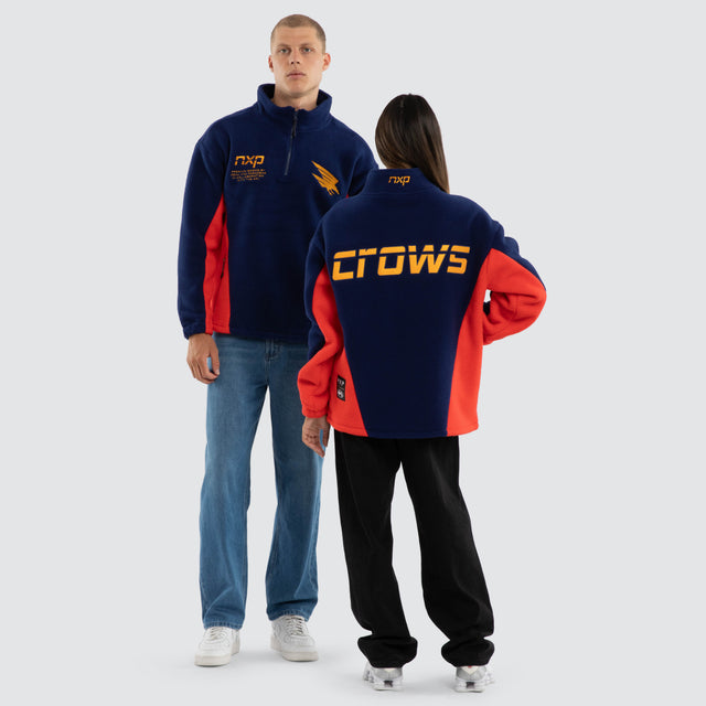 Model wears Adelaide Crows AFL Defence Pullover Navy Blue & Red Jumpers in Blue - Image 3