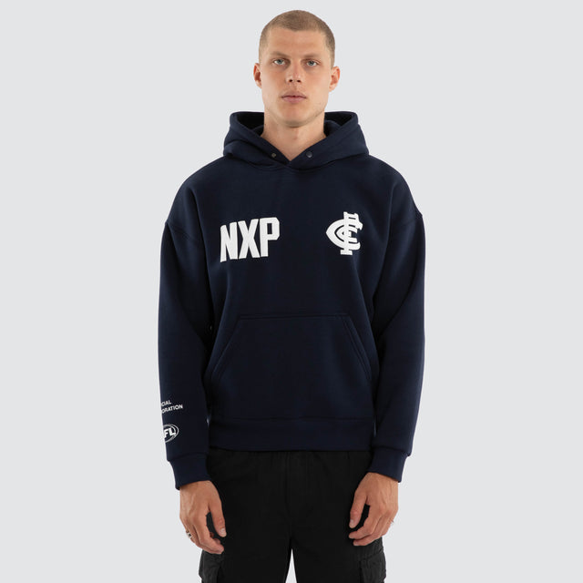 Model wears Carlton Blues AFL Top Tier Hoodie Navy Hoodies in Blue - Image 3