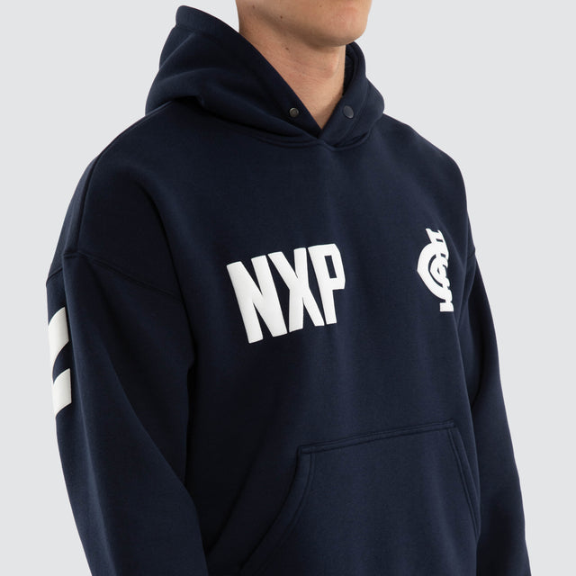 Model wears Carlton Blues AFL Top Tier Hoodie Navy Hoodies in Blue - Image 5