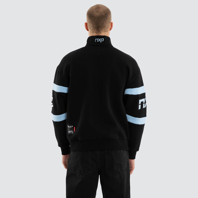 Model wears Carlton Blues AFL Allied Pullover Jet Black Jumpers in Black - Image 5