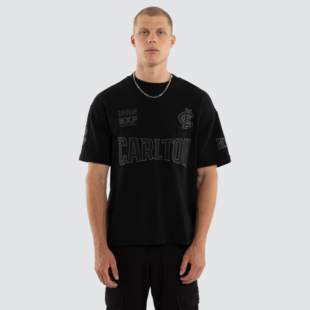 Model wears Carlton Blues AFL Perform Loopback Tee Jet Black T-Shirts in Black - Image 2