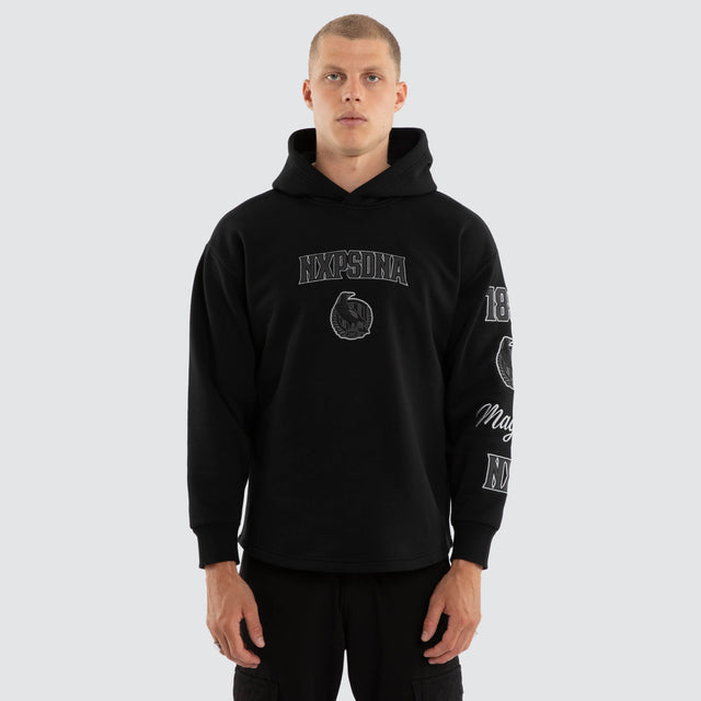 Model wears Collingwood Magpies AFL Simulation Hoodie Jet Black Hoodies in Black - Image 3