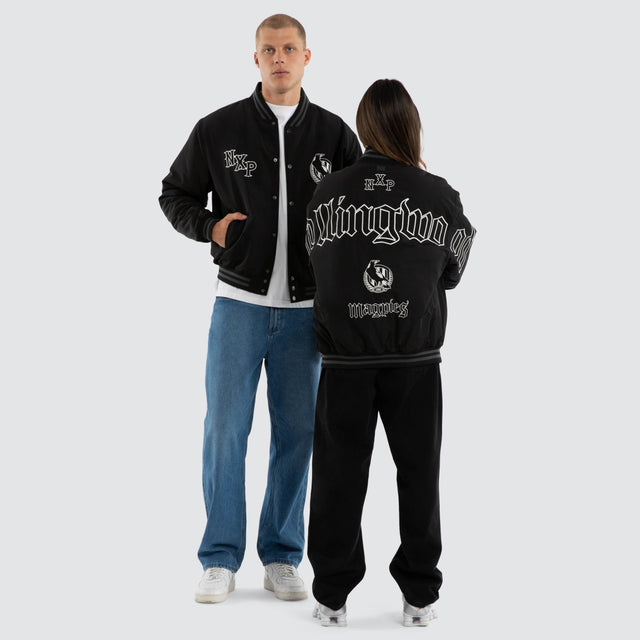 Model wears Collingwood Magpies AFL Retro Bomber Jet Black Jackets in Black - Image 5