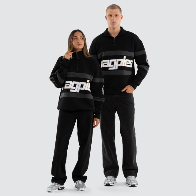 Model wears Collingwood Magpies AFL Allied Pullover Jet Black Jumpers in Black - Image 4