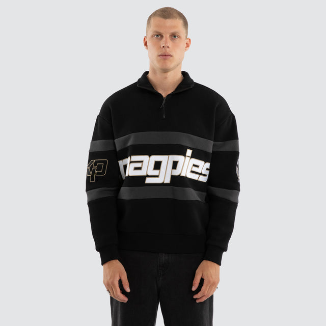 Model wears Collingwood Magpies AFL Allied Pullover Jet Black Jumpers in Black - Image 2