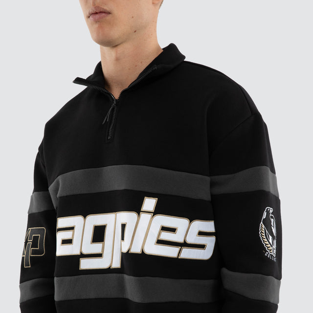 Model wears Collingwood Magpies AFL Allied Pullover Jet Black Jumpers in Black - Image 3