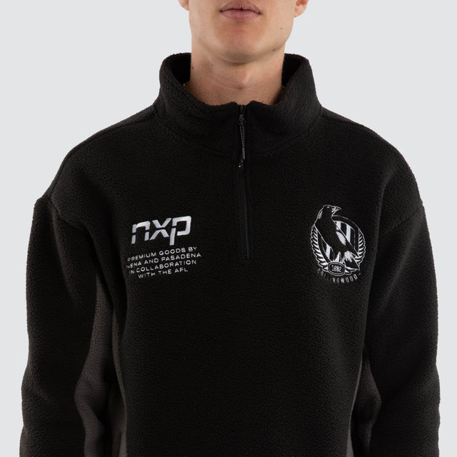 Model wears Collingwood Magpies AFL Defence Pullover Black & Grey Jumpers in Grey - Image 3