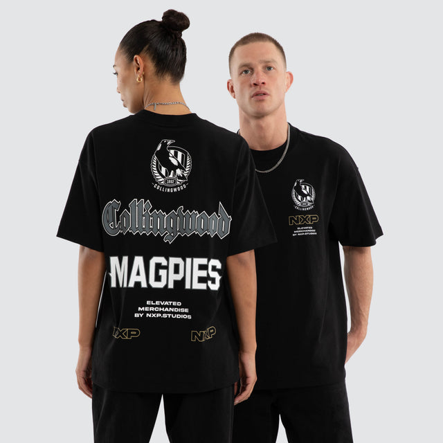 Model wears Collingwood Magpies AFL Sticker Raptor Tee Jet Black T-Shirts in Black - Image 4